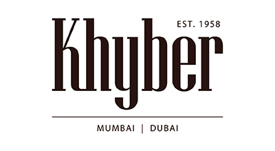 The image displays a logo for "Khyber" with bold, black serif typography. Above the name, "EST. 1958" is written in small uppercase letters. Below the name, "Mumbai | Dubai" is printed, indicating the restaurant's locations.