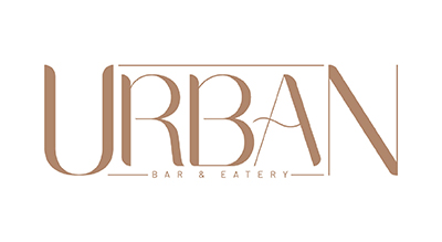 تُظهر الصورة شعارًا لمكان يُدعى "URBAN BAR & EATERY". تم تصميم النص بخط أنيق وحديث يجمع بين السماكات المختلفة. يحيط بكلمة "URBAN" إطار مستطيل يضفي لمسة راقية. يبدو أن الألوان المستخدمة هي البني أو الذهبي على خلفية بيضاء، مما يمنح التصميم مظهرًا أنيقًا وبس