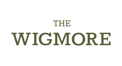 الشعار يوضح "The Wigmore Tavern" باللون الاخضر والخلفيه بيضاء