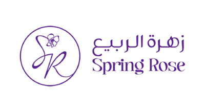 الصورة عبارة عن شعارزهرة الربيع مكتوبة باللون البنفسجي مع خلفيه الابيض