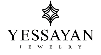 الصورة عبارة عن شعار Yessayan مكتوبة باللون الاسود مع خلفيه ابيض