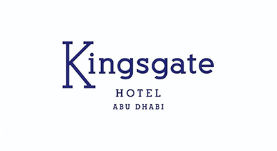 الصورة عبارة عن شعار Kingsgate Hotel مكتوبة باللون الازرق مع خلفيه ابيض